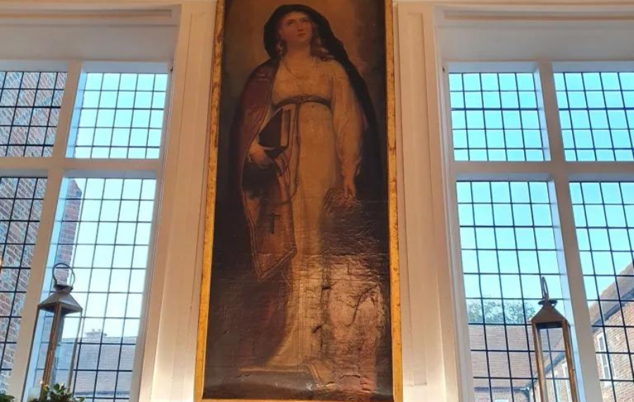 St Margaret (Credit: Fulham Palace) A picture of a large painting of a saintly looking white woman in Christian, religious clothing. Painted in an old, romantic style.