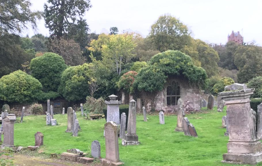 St Dionysius Church – (Credit: Ayton Heritage SCIO) Ivy covered, ruin of a church sits in a graveyard.